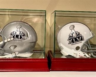 Item 35:  Super Bowl XLIX mini helmet (left):  $55                                                    Item 36:  Super Bowl XLVI mini helmet (right):  $55