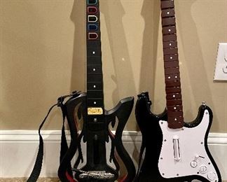 Item 161:  Guitar Hero (left):   $32                                                                                   Item 162:  Fender Game Guitar (right): $32