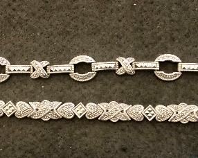 Item 215:  Sterling Silver and Marcasite Bracelet, X and O: $58                                                                                                       Item 216:  Sterling Silver and Marcasite Bracelet, (Bottom): $58