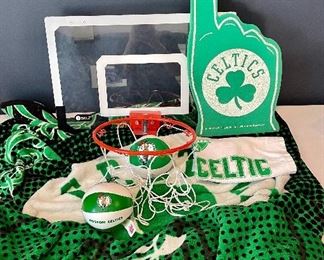 Item 281:  Lot of Celtics items including foam finger and over the door basketball hoop, fleece: $24