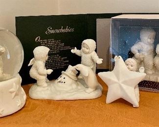 Item 348:  Snowbabies snow globe (far left): $18                                     Item 349:  Snowbabies with snowman (middle): $18                           Item 350:  Snowbabies with star (3rd from left): $10                         Item 351:  Snowbabies in box (far right): $14