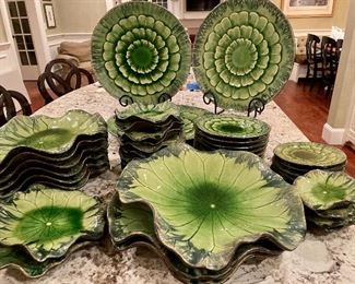 Item 484:  Large collection of brilliant green ceramic decorative plates for display. All plates are ready to hang on wall - by Global Views: $325 for all (or priced individually at the sale)