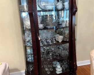 Empire bow front Antique china cabinet