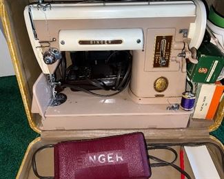 Singer 301A sewing machine with folding table that holds machine