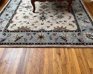 about 9' by 7' area rug