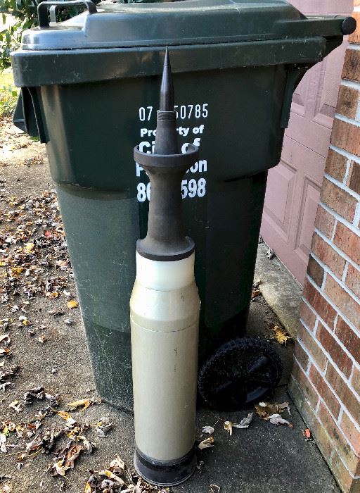 This is a tank missile used like a salesman's sample. It is cut in half, seen in the next picture to show how it is made. 