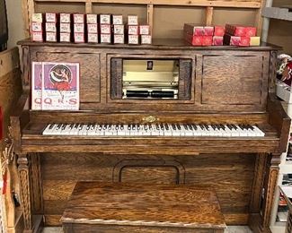 Player piano with rolls