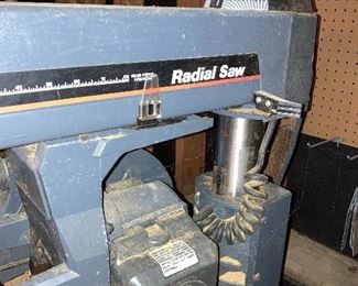 Large Radial Saw on Wheels in Basement