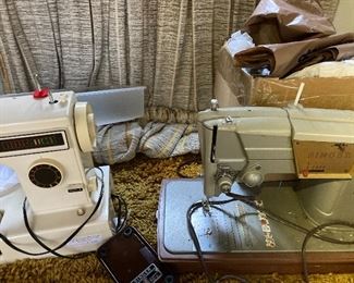 2 Vintage Sewing Machines there is another one not pictured in Garage