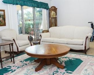 Round oak coffee table and living room furniture