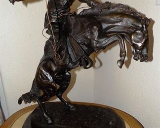 “Bronco Buster” by Frederic Remingon