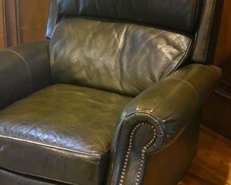 Haverty's green leather recliner with nailhead trim
