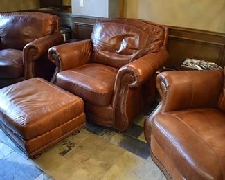 Three Fabulous leather club chairs, One ottoman with nail head tacks! 