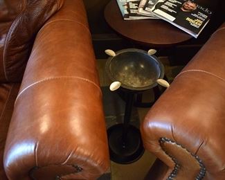 cigar ashtray (1), dark wood side table (2), leather club chairs (3), ottoman (1), nailhead trim