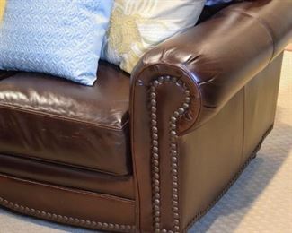 Cordovan leather sofa (detail, nailhead trim)