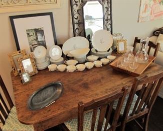 Antique reclaimed barnwood handmade dining table & antique chairs.