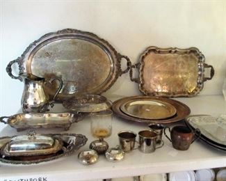 Antique silver-plated serving pieces.