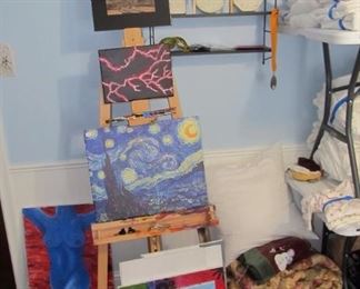 Artist painting easel