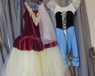 Several quality girls dress up, dance, play, or costume dresses.