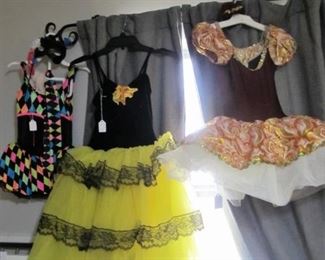 Several quality girls dress up, dance, play, or costume dresses.