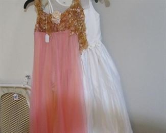 Several quality girls dress up, dance, play, or costume dresses.