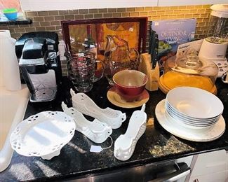 Lots of goodies in the kitchen including a Kitchen Aid - Proline Series. Featured are - Bormioli, Tefal, Cuisinart, Keurig, La Creuset, Cast-iron, Longaberger, Gibson, Threshold, Corningware, Folk Craft, YHY, Gloria Vanderbilt, Revereware, & more!