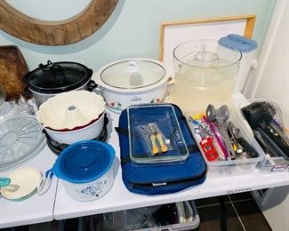 Lots of goodies in the kitchen including a Kitchen Aid - Proline Series. Featured are - Bormioli, Tefal, Cuisinart, Keurig, La Creuset, Cast-iron, Longaberger, Gibson, Threshold, Corningware, Folk Craft, YHY, Gloria Vanderbilt, Revereware, & more!
