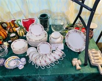 45pc. Fine porcelain china by Creative, "Regency Rose" The metal item is actually a fishing lure mold.