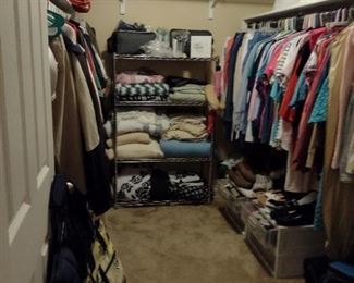 Closets full of clothing and linens