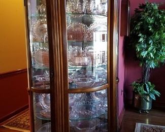 Beautiful curio cabinet with curved glass and mirror back