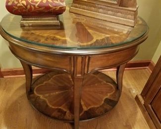 Round inlaid table with protective glass top