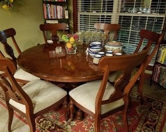 Cherry dining table and six cherry dining chairs (includes a leaf not shown)