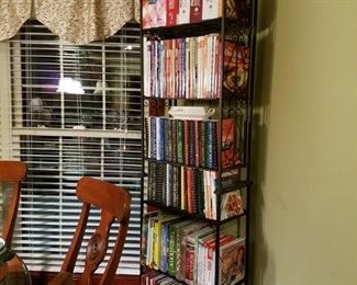 Another metal shelf full of cookbooks