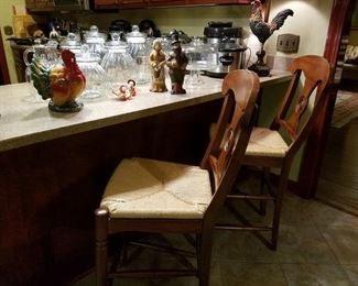 Two cherry bar chairs