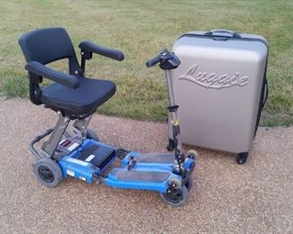 Freerider 'Luggie' folding battery powered scooter (includes travel case, charger, and extra battery)