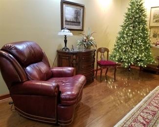 Hancock & Moore leather power recliner, cherry commode, and pre-lit Christmas tree