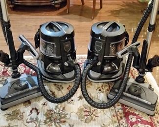 Two Rainbow vacuum cleaners