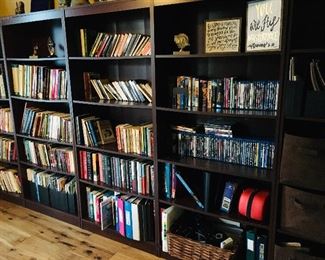 Bookcases, books, movies, records, and DVDs