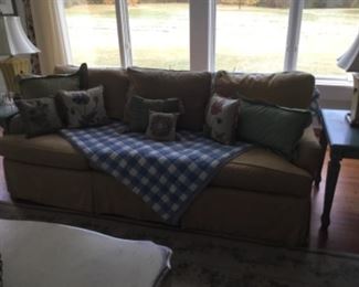 Hard to see…sofa, end table and a pair of lamps