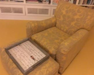 Upholstered chair and ottoman