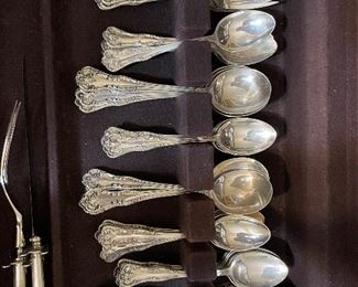 #56___$1,950
Sterling silver flatware 113 pieces Chatelaine (1894)
12 Dinner knifes 
12 Dinner Forks 1.67 oz x12 = 20 oz
24 Teaspoons 1.10 oz x 24 = 26.4 oz
12 soup spoons 1.23 x 12 = 14.76 oz
12 dessert forks 1.15 oz x 12 = 13.8 oz
12 butter spreaders 0.96 x 12 = 11.52 oz
11 ice tea spoons 0.98 x 11 = 10.78 oz
12 appetizer forks 0.76 x 12 = 9.12 oz
1 carving set 
1 cake server 
2 serving spoons 3.18 oz
1 meat fork 1.66 oz
1 sugar spoon 0.80 oz 
Total 113 pieces 		Total weight 112 oz
The key mark was originally from Franklin silver plated company then after 1920’s scarcely used by Lunt.