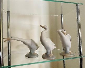 #61___$50
Lladro set of 3 swans
Lladro damaged $30 - 2 other small ones $24 each.
Lladro dog $40
