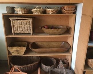 Samples of antique wood dough bowls, baskets