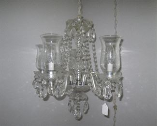 There are several swag chandeliers in the house