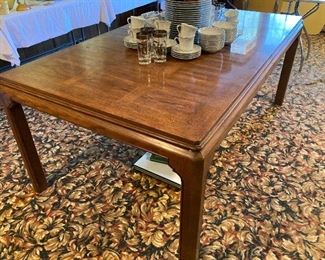 elegant dining table with two leaves
