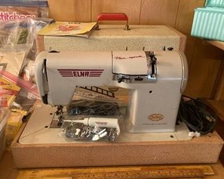 vintage Elna portable sewing machine with carry case
