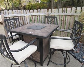 Patio table with built in fit pit and 4 chairs