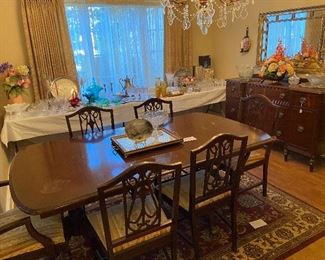 Formal dining table with 6 chairs.