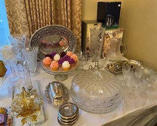 Lots of crystal, pewter, silver-plate.