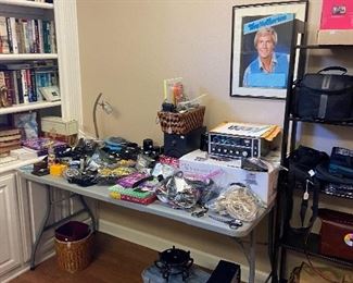 PACKED room of electronics and books.